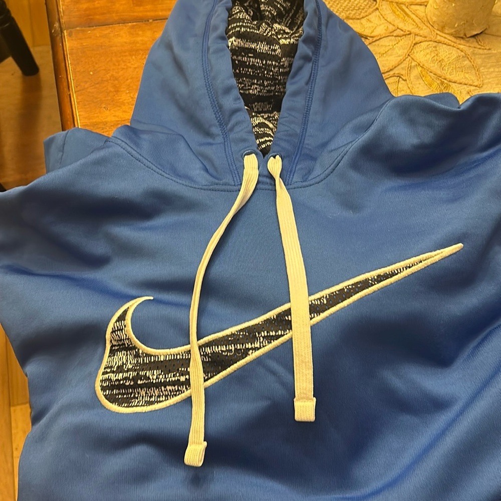 Blue white and black Nike hoodie